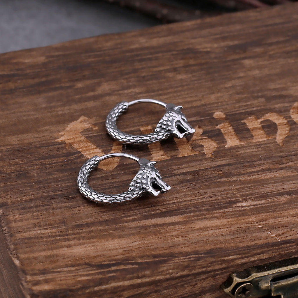 Cirkelformade hoops föreställande ulvar