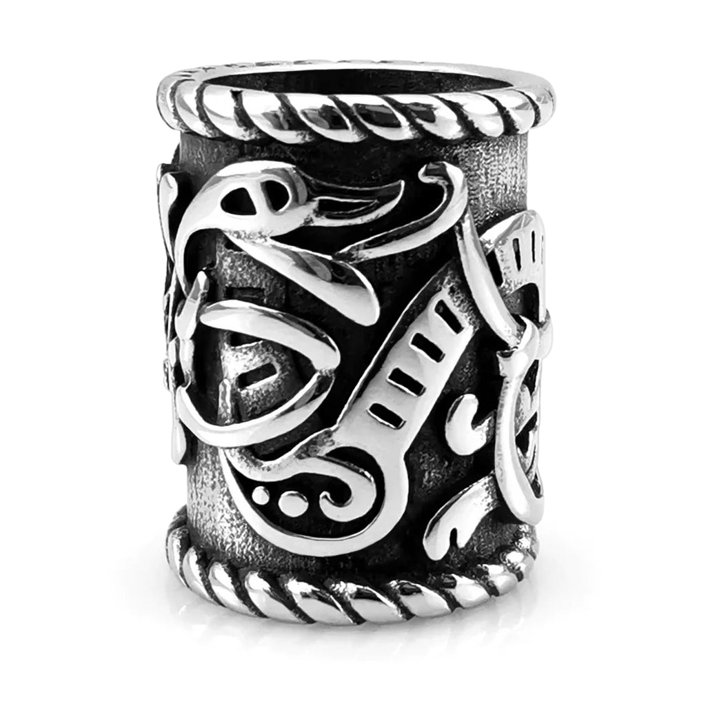 Stålfärgad viking skäggprydnad utsmyckad med nordisk djurornamentik