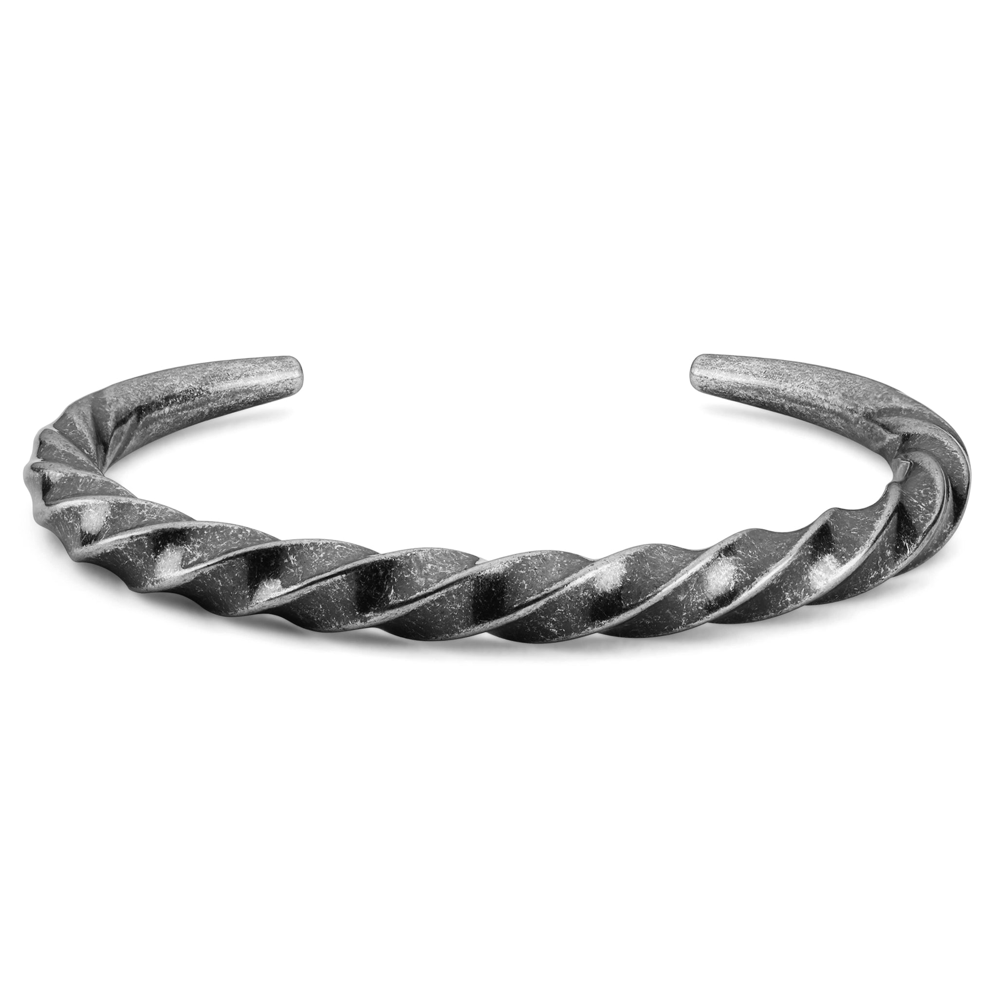 Vikingatida armbygel i spiralform, tillverkad av gråfärgat rostfritt stål