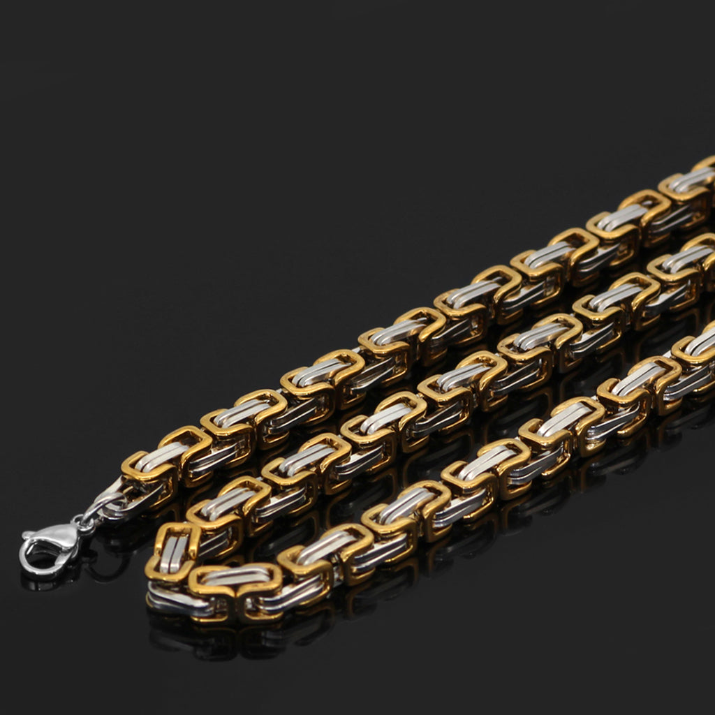 Halskedja med hälften förgyllda och hälften silverfärgade länkar