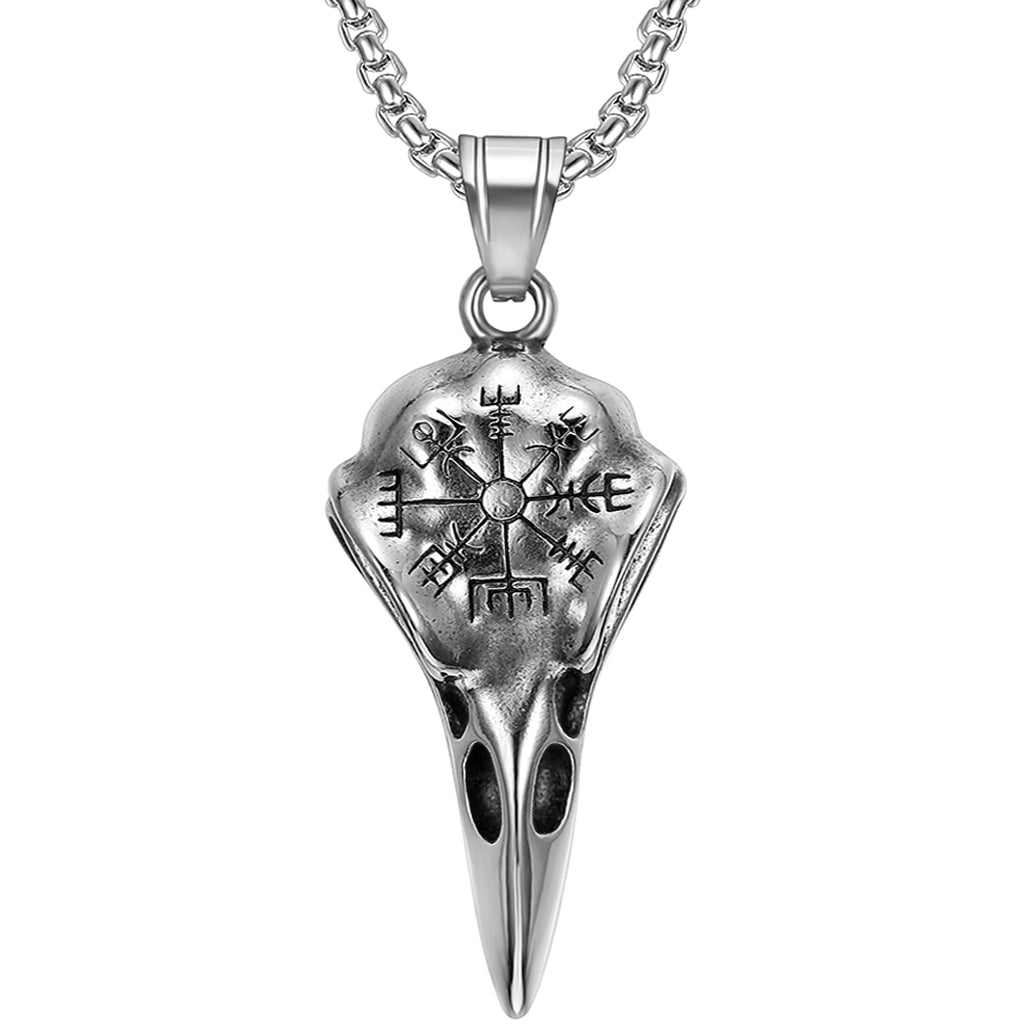 Halsband avbildande kranium från korp