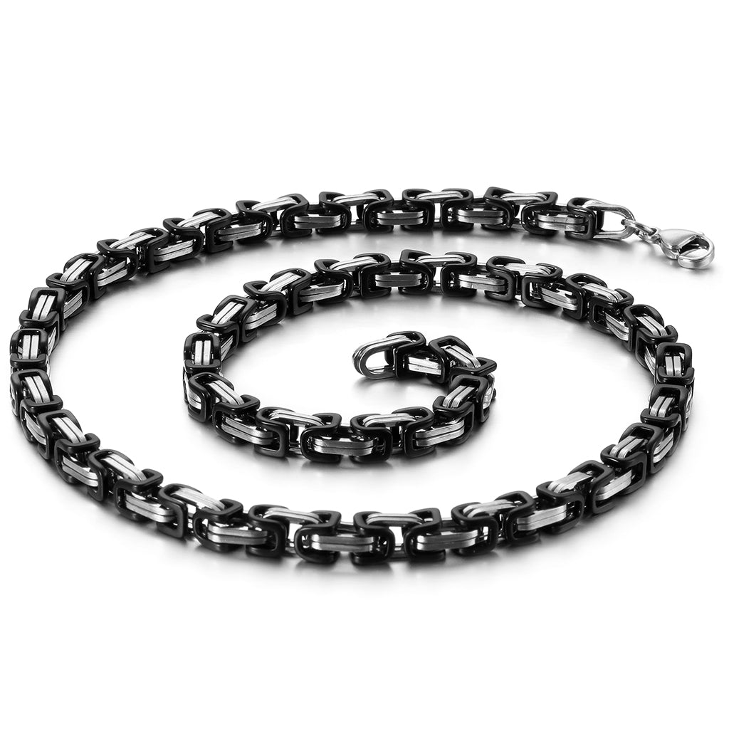 Kungslänk med svart- och stålfärgade länkar