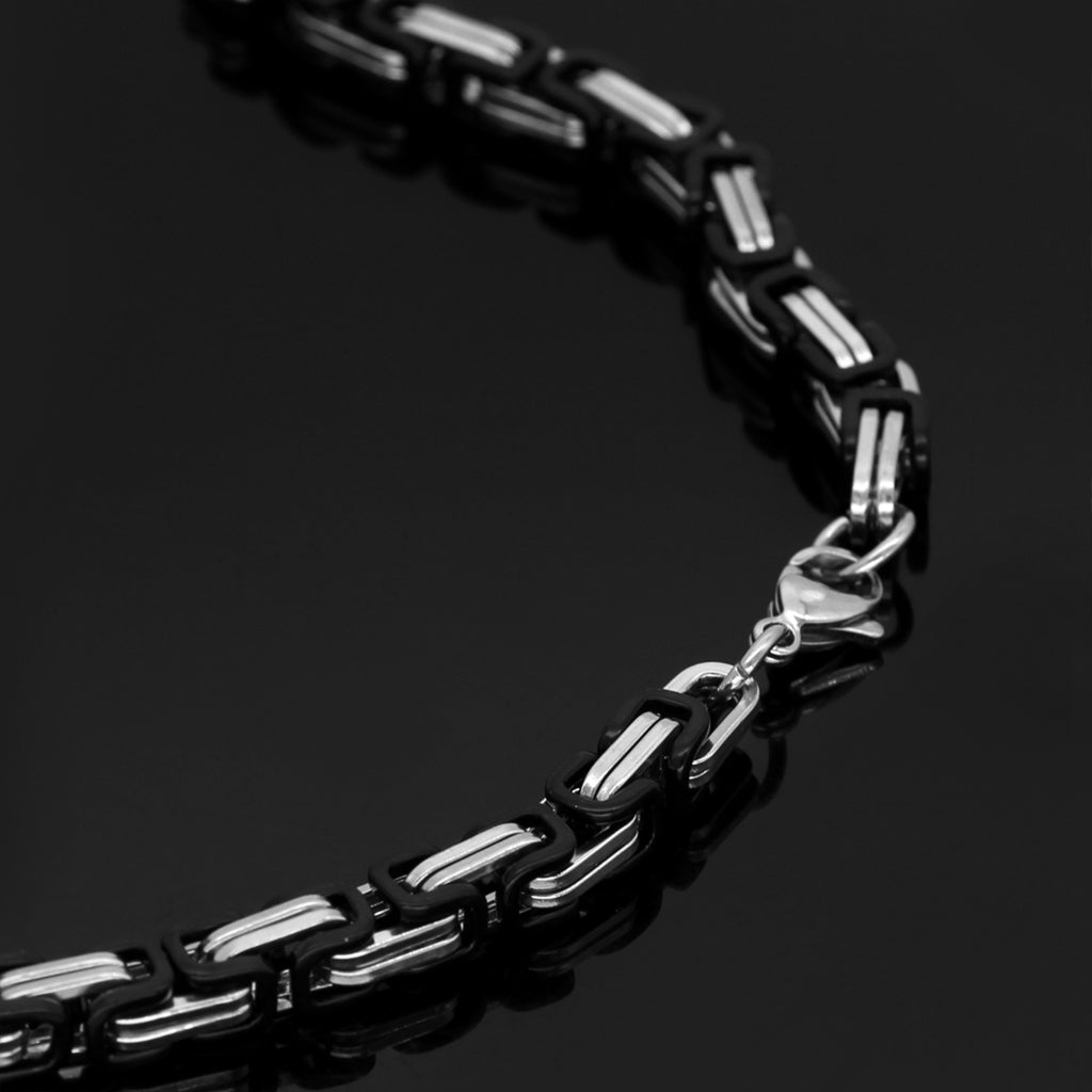 Stål- och svartfärgat armband för män