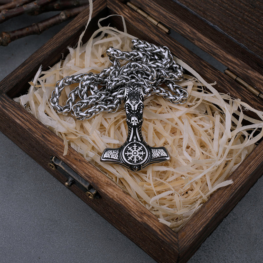 Torshammare i rostfritt stål med kranium på skaftet