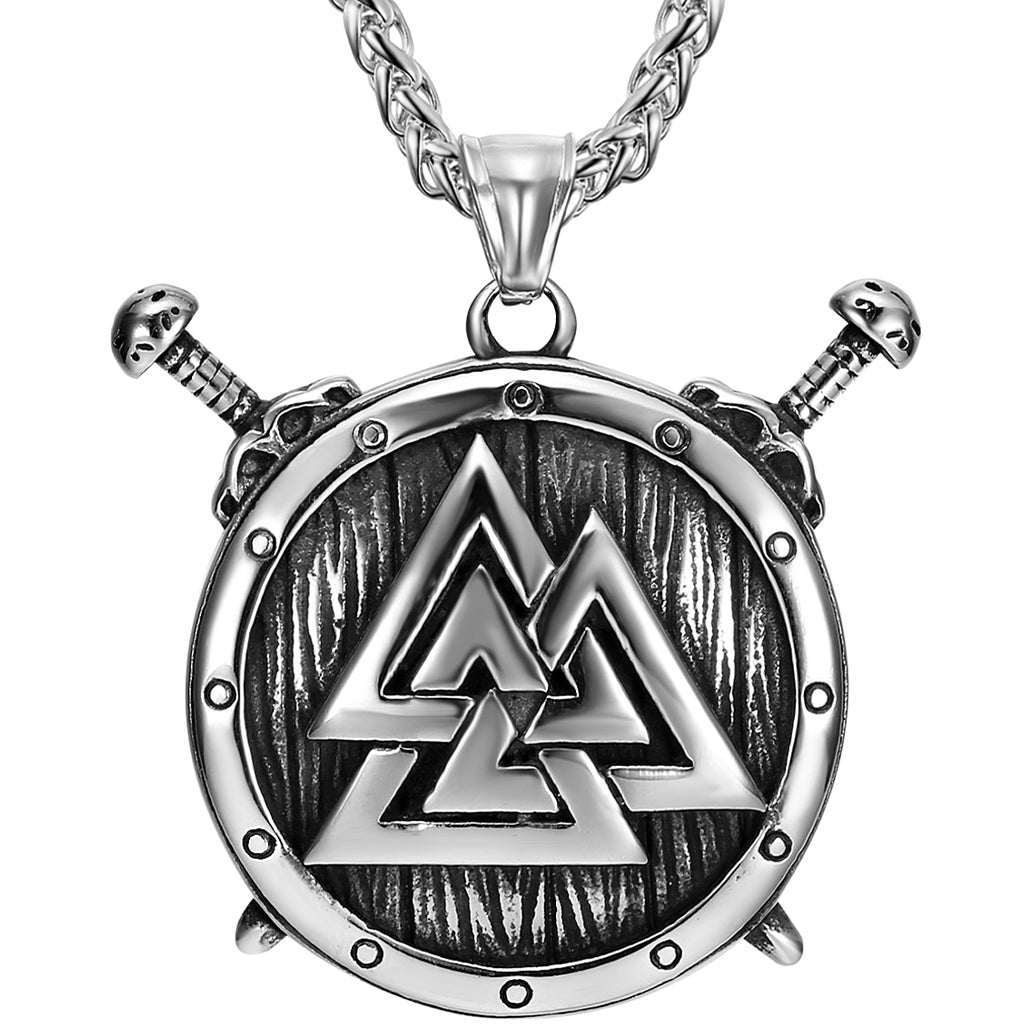 Hänge föreställande en rund träsköld utsmyckad med valknut