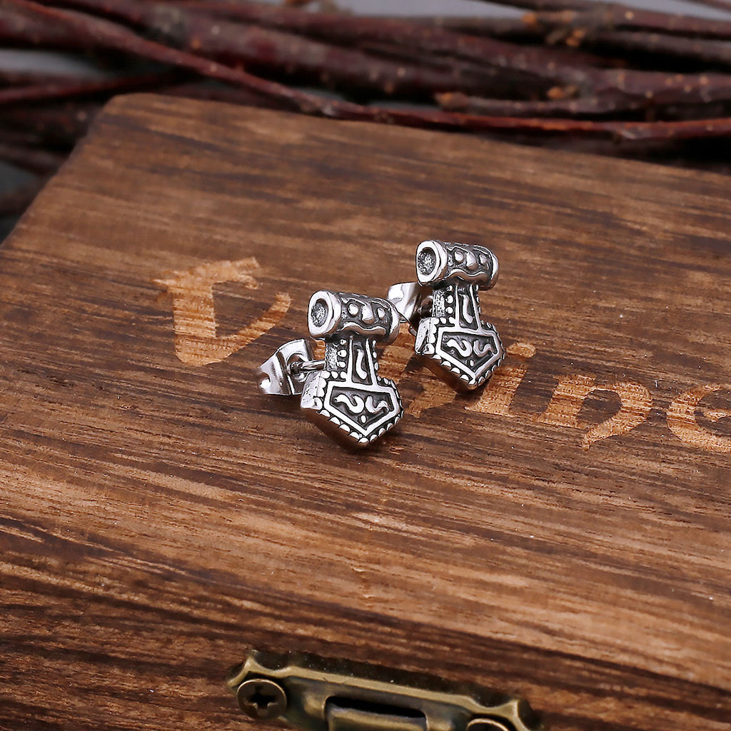 Silvriga viking ear studs för herrar