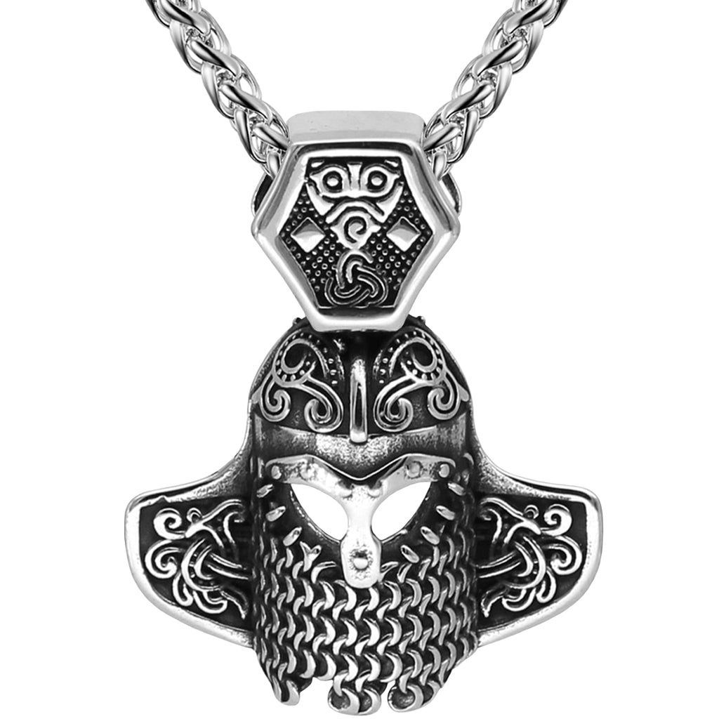 Viking halsband föreställande rikligt utsmyckad stridshjälm