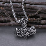 Nordisk Torshammare-amulett med gravyr av en triquetra