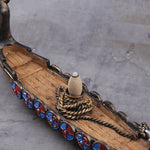 Skeppsmodell avbildande långsmalt krigsfartyg från vikingatiden