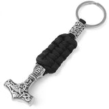 Viking nyckelring i form av en silvrig Torshammare med svart paracord