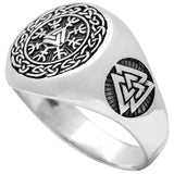 Silverfärgad ring i rostfritt stål med de två fornnordiska symbolerna aegishjalmur och valknut