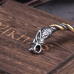 Vikingatida armband i guld/silver med flätad repdesign
