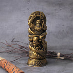 Figurin i polyresin föreställande guden Tor från nordisk mytologi