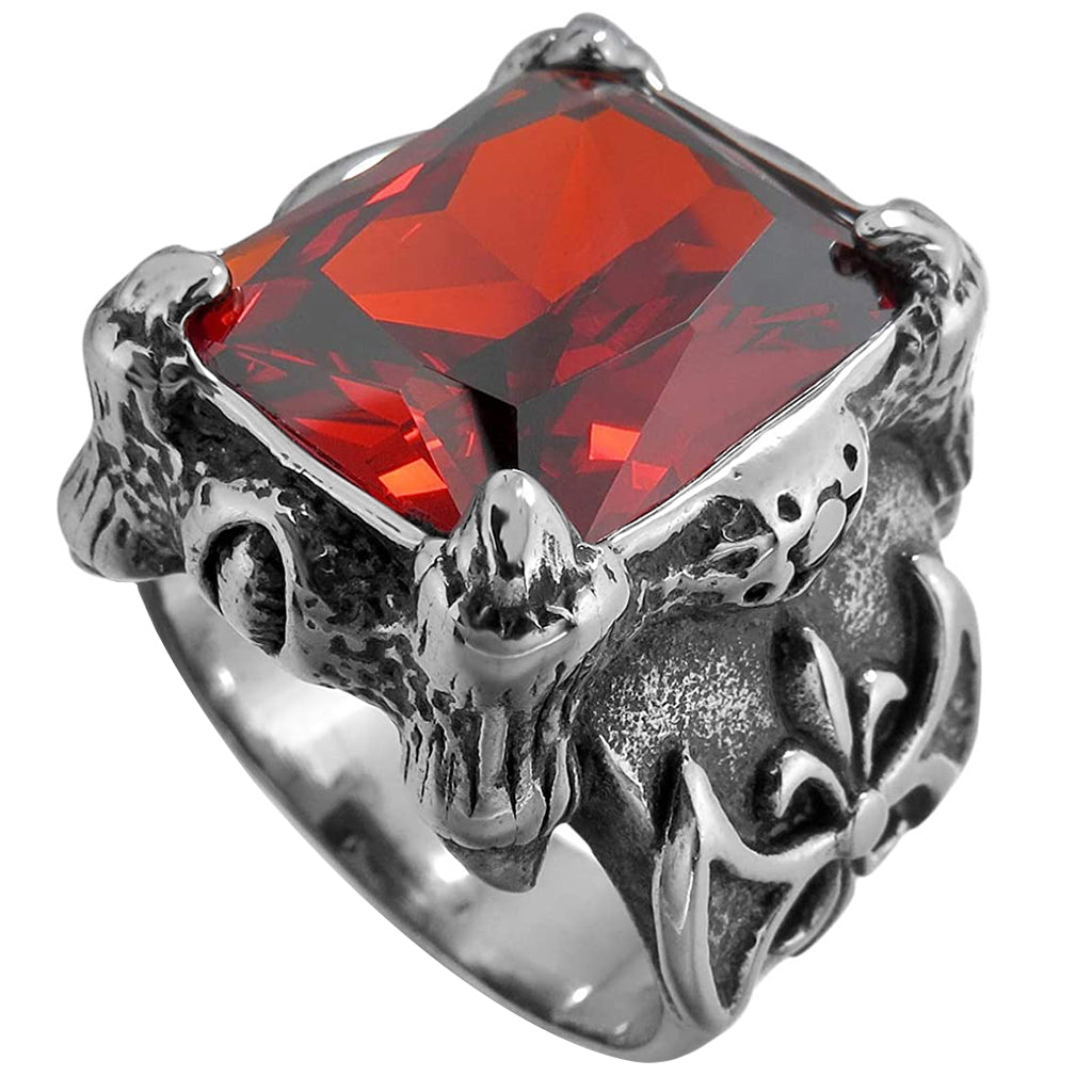 Fornnordisk klackring i stål med röd diamant framtill på ringen
